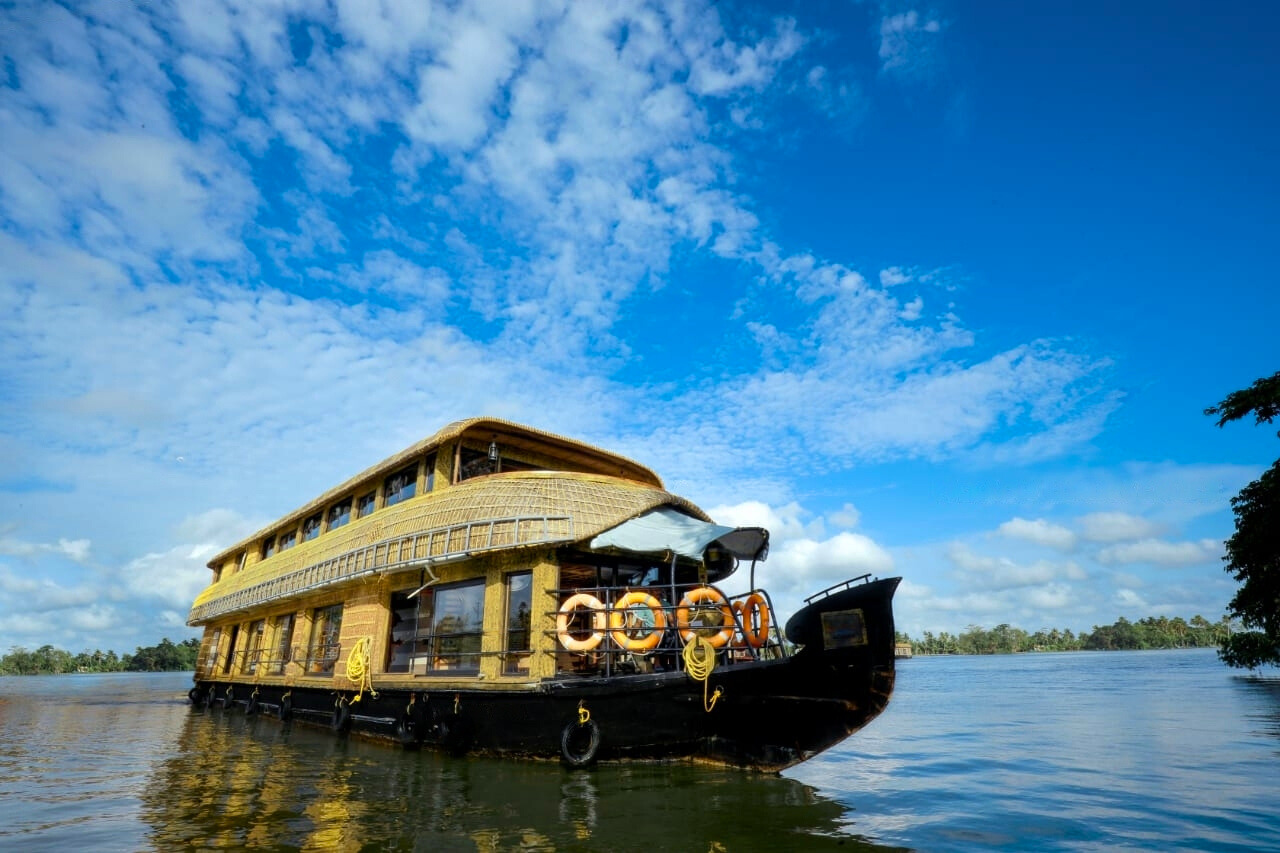 Houseboat cruising through the Alleppey river